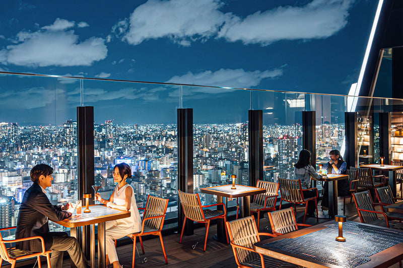 Rooftoop outdoor dining at Centara Grand Osaka featuring NEOZ Cooee Portable Table Lamp