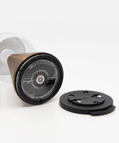 NEOZ N1 Cordless Lamp Lock base plate beside the N1-compatible base of a Piccolo Bronze lamp, made in Australia