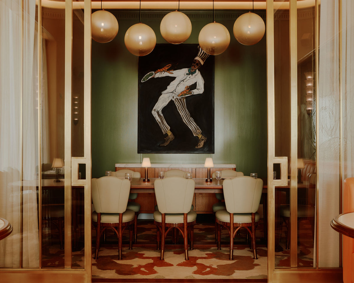 Aged brass NEOZ Victoria cordless table lamps lighting the private dining room at Mamani restaurant in Dallas.