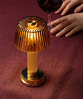Manhattan Portable Table Lamp, CNC solid forged brass body paired with Amber glass lampshade  